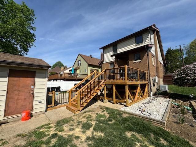 TimberCraft 10' x 12' Custom Deck with Matching Fence
